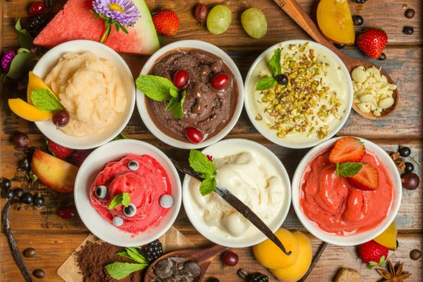 Top view of different flavors of ice cream in bowls